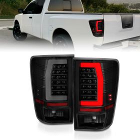 AmeriLite for 2004-2015 Nissan Titan A60 C-Type LED Tube Smoke Black Replacement Tail Lights Pair - Driver and Passenger Side