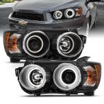 AmeriLite for 2012-2016 Chevy Sonic Clear Black Xterme LED Halo Rings Projector Replacement Headlights Pair - Passenger and Driver Side
