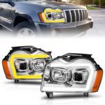 AmeriLite for 2005-2007 Jeep Grand Cherokee WK Switchback LED Tube Square Projector Chrome Headlights Assembly - Driver and Passenger Side