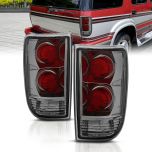 AmeriLite for 1995-2005 Chevy Blazer GMC Jimmy S-10 S-15 Smoke Euro Tail Lights Aftermarket Brake Lamps Pair - Passenger and Driver Side