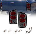 AmeriLite for 2002-2006 Dodge Ram 1500 | 03-06 Ram 2500 3500 Pickup Euro-Style Smoke Chrome Replacement Taillights Pair - Driver and Passenger Side