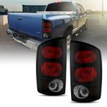 AmeriLite for 2002-2006 Dodge Ram 1500 | 03-06 Ram 2500 3500 Pickup Euro-Style Clear Black Replacement Taillights Pair - Driver and Passenger Side