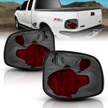 AmeriLite for 1997-2000 Ford F150 Flare Side Smoke Euro Replacement Brake Tail Lights Set - Passenger and Driver Side