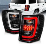 AmeriLite for 1999-2004 Jeep Grand Cherokee C-Type LED Tube Black Replacement Tail Lights Set- Passenger and Driver Side