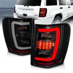 AmeriLite for 1999-2004 Jeep Grand Cherokee C-Type LED Tube Dark Black Replacement Tail Lights Set- Passenger and Driver Side