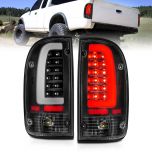 AmeriLite for 1995-2000 Toyota Tacoma C-Type LED Tube Black Replacement Tail Light - Driver and Passenger Side