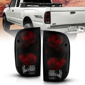 AmeriLite Black Smoke Replacement Tail Lights For 95-00 Toyota Tacoma Pickup Truck- Passenger and Driver Side. Bulb and Harness included