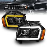 AmeriLite for 2005-2007 Jeep Grand Cherokee WK Switchback LED Tube Square Projector Black Headlights Assembly - Driver and Passenger Side